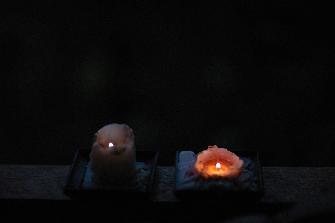 Vigil candles comforting remembrance, tribute to grandmother.