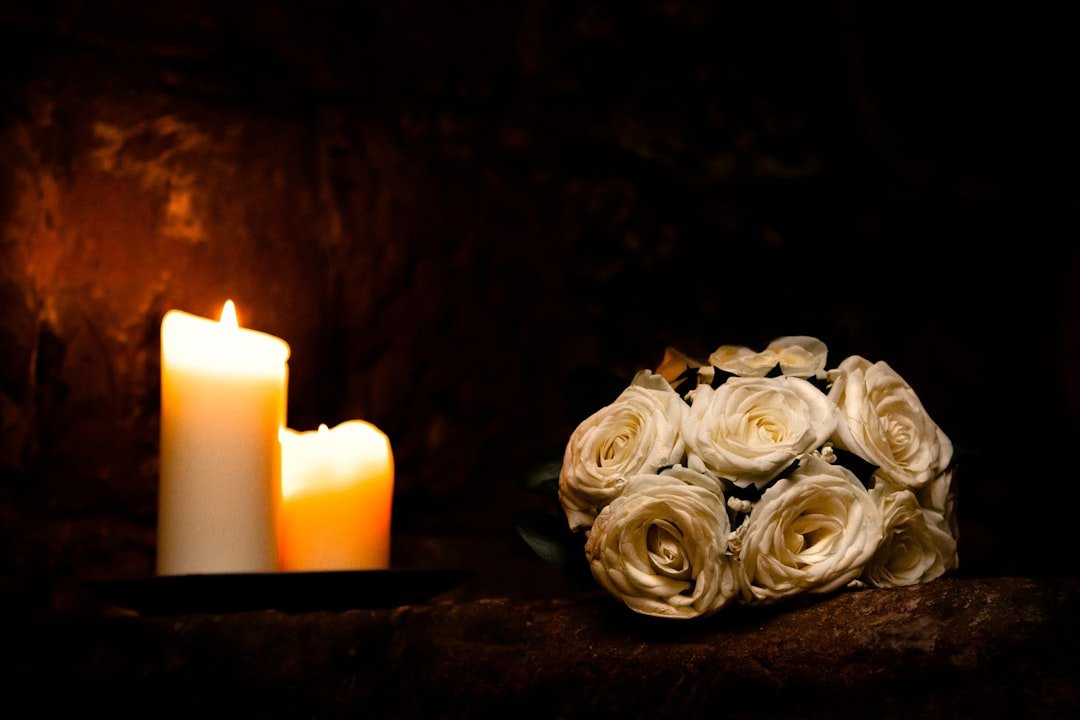 White roses, candles: Private vs. Public Memorials choice.