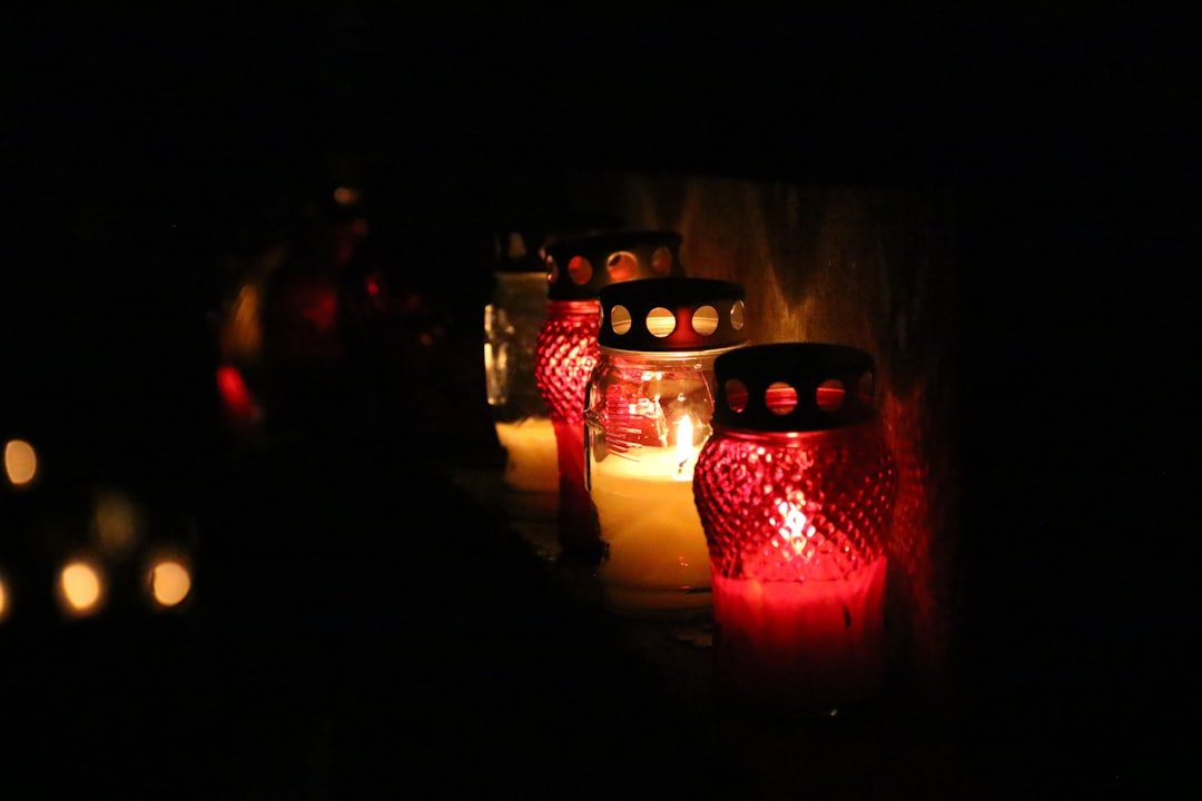 Lit candles in dark setting, <a href=