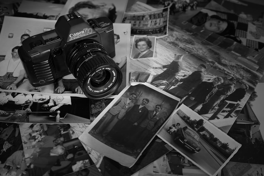 Camera, photos, capturing family memories and contributions.