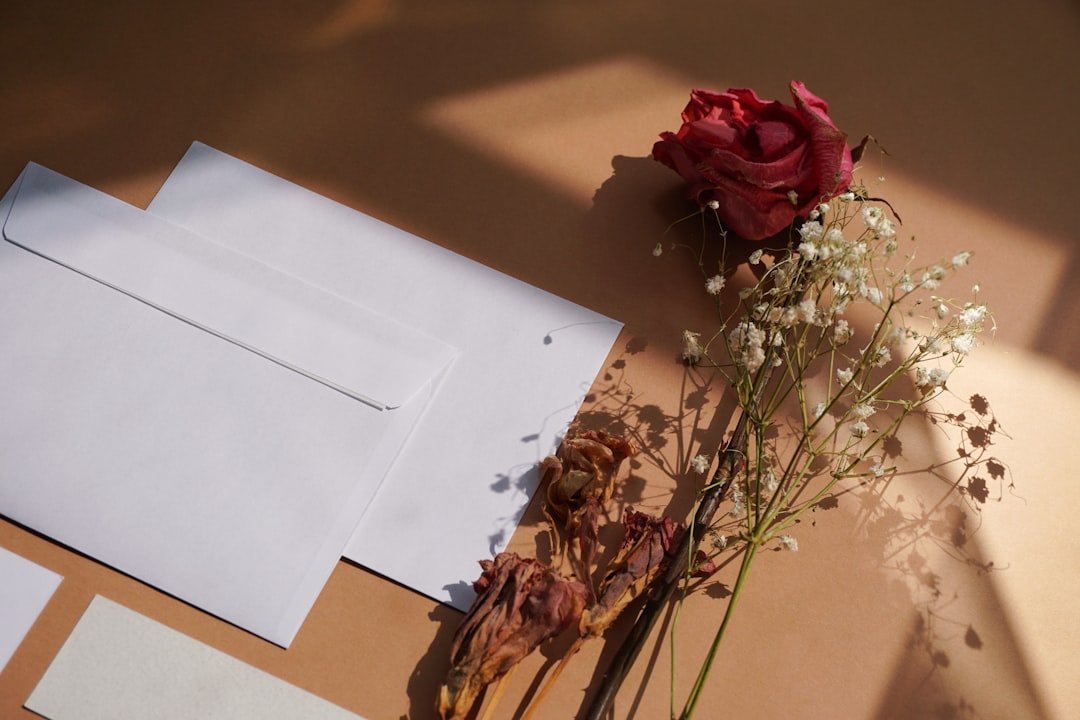 Red rose bouquet, white paper: Goodbye letter to deceased ex.