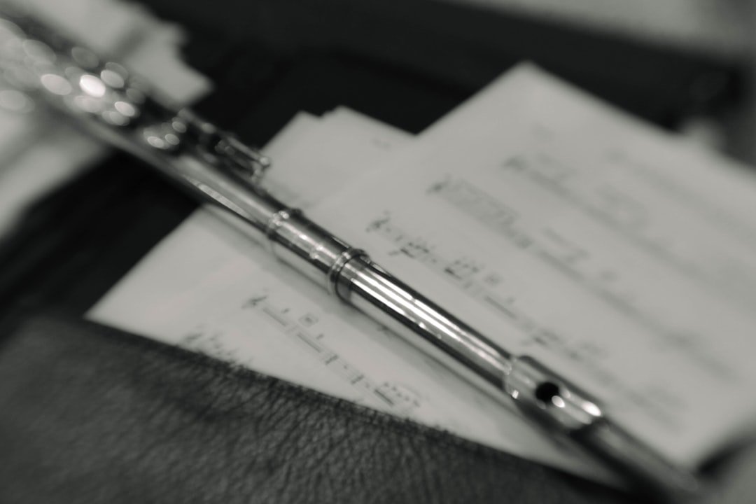 Pen on paper for goodbye letter to estranged parent.