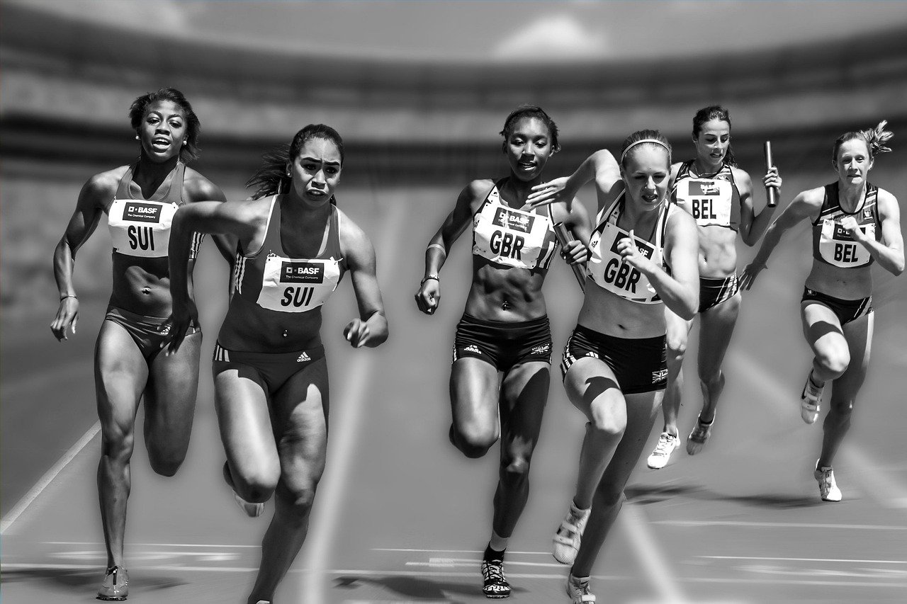 Monochrome female athlete running race, gone too soon.